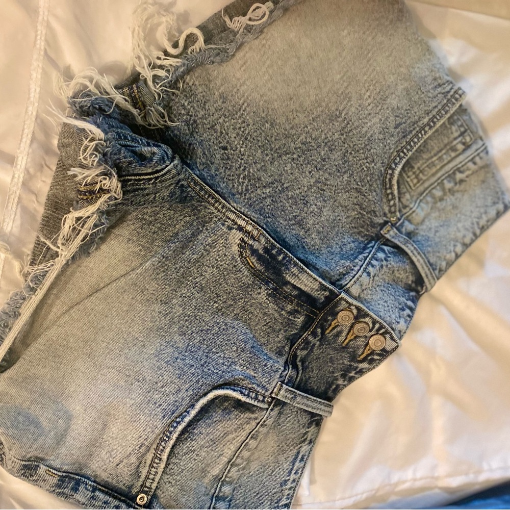 Distressed Blue Denim Jeans